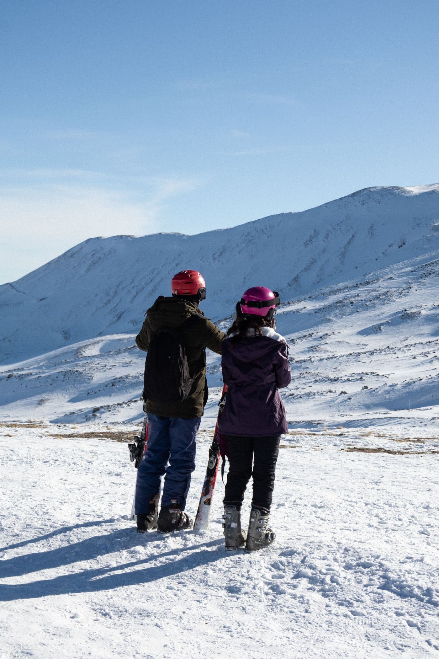 Two skiers spending a day in the alpine
